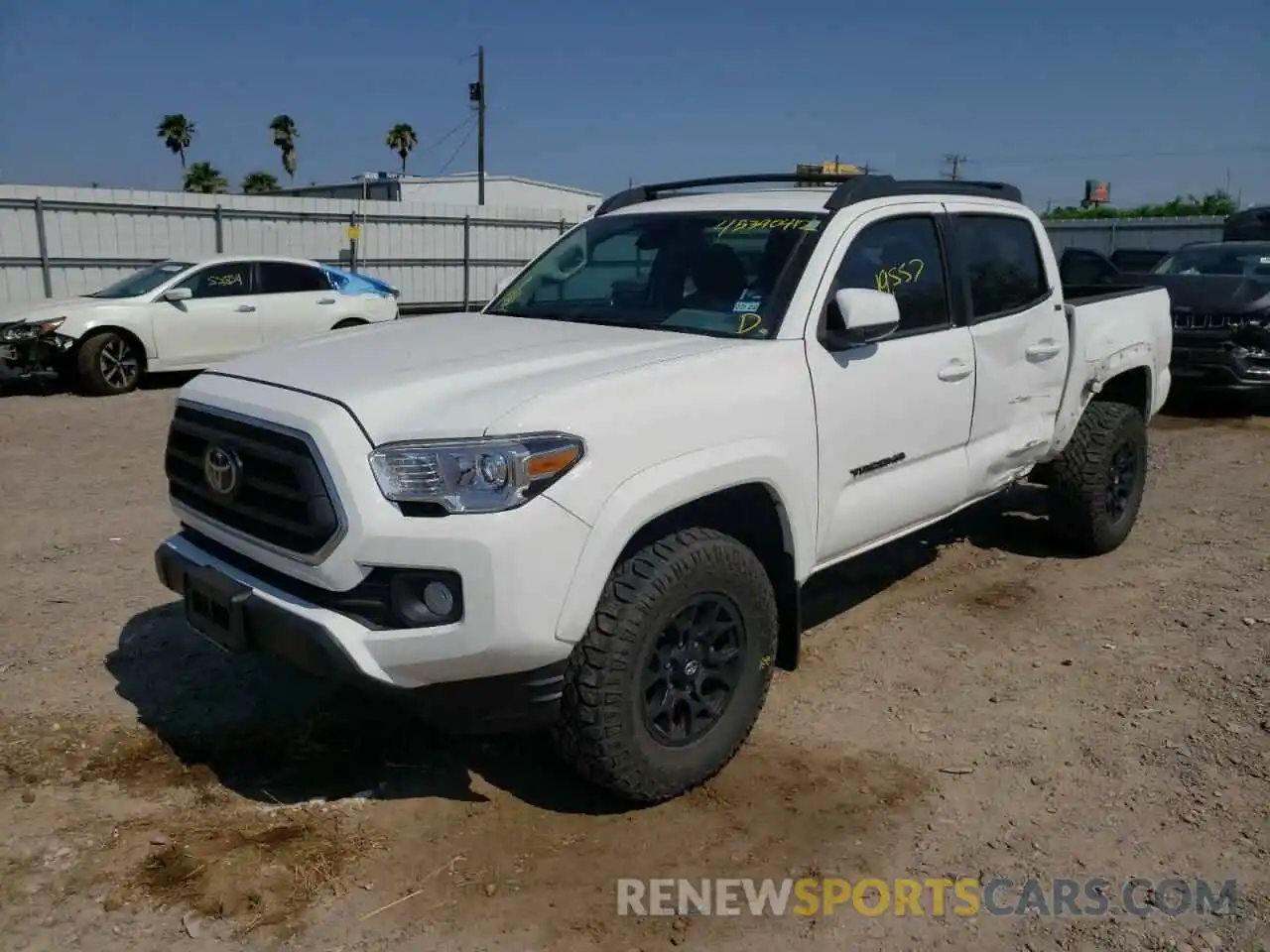 2 Photograph of a damaged car 5TFAZ5CN8LX091559 TOYOTA TACOMA 2020