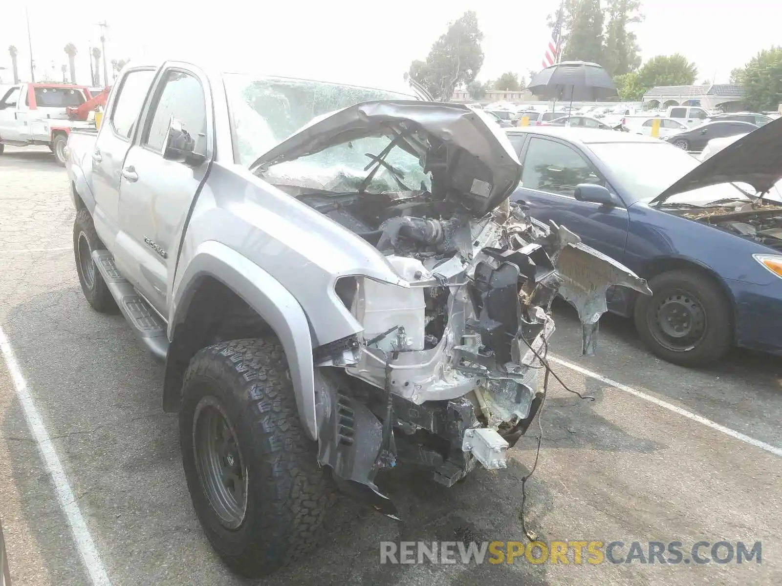 1 Photograph of a damaged car 5TFAZ5CN9LX089612 TOYOTA TACOMA 2020