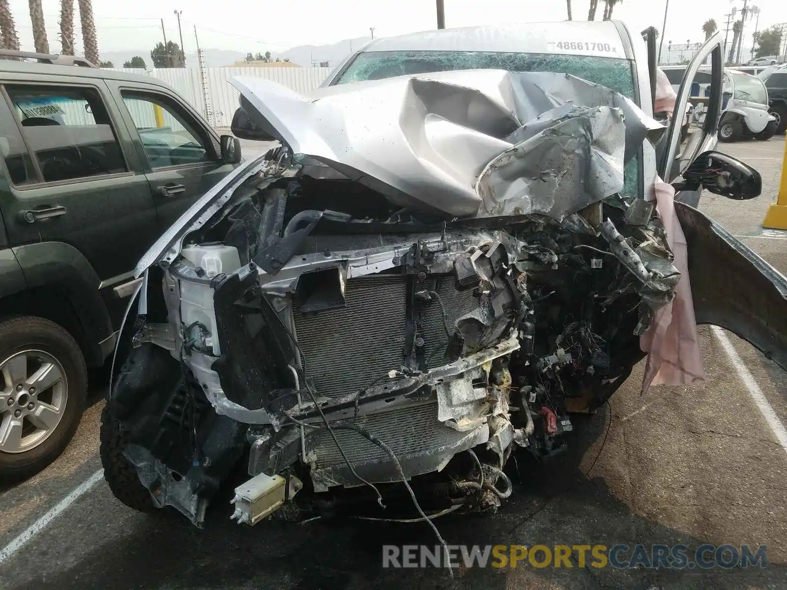 7 Photograph of a damaged car 5TFAZ5CN9LX089612 TOYOTA TACOMA 2020