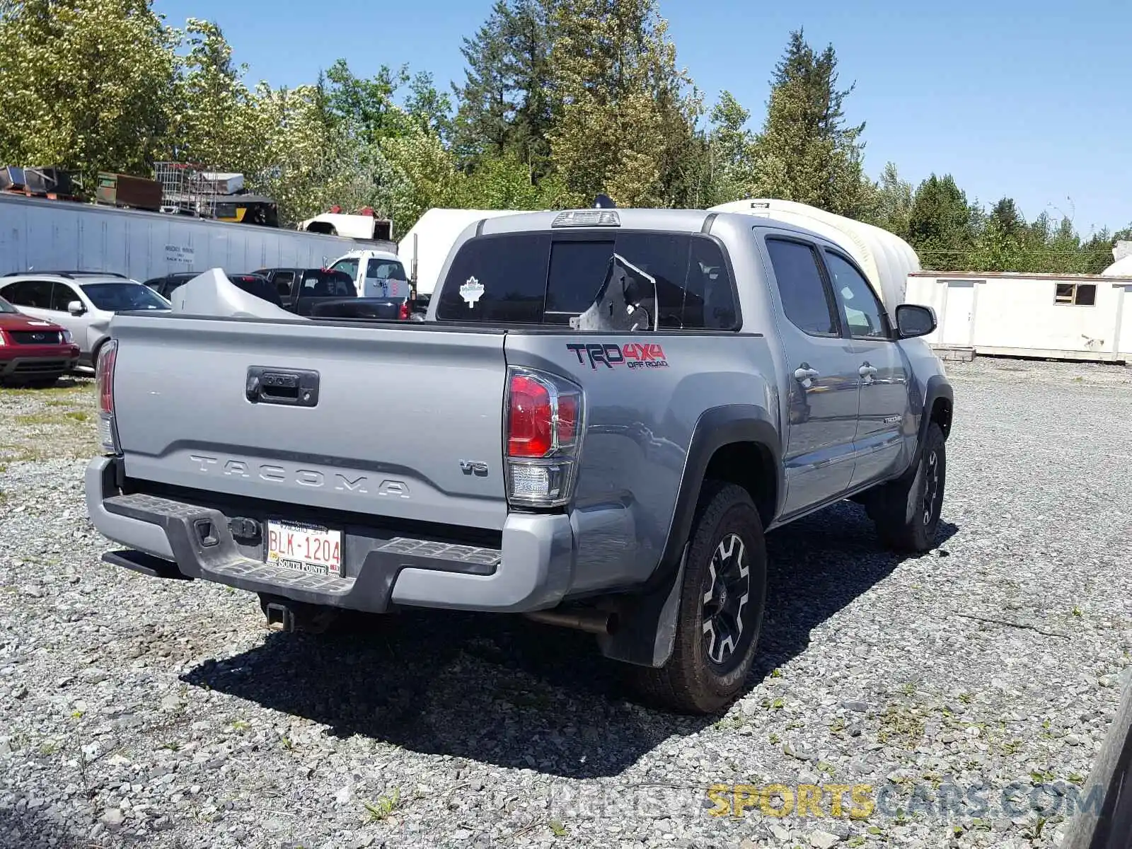 4 Photograph of a damaged car 5TFCZ5AN0LX215982 TOYOTA TACOMA 2020