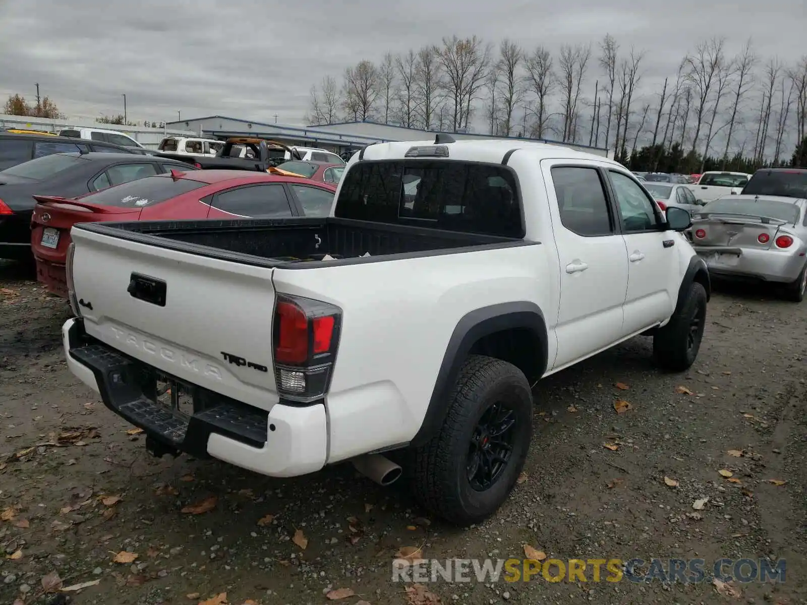 4 Photograph of a damaged car 5TFCZ5AN0LX218526 TOYOTA TACOMA 2020