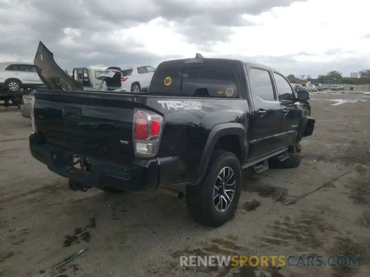 4 Photograph of a damaged car 5TFCZ5AN0LX230000 TOYOTA TACOMA 2020