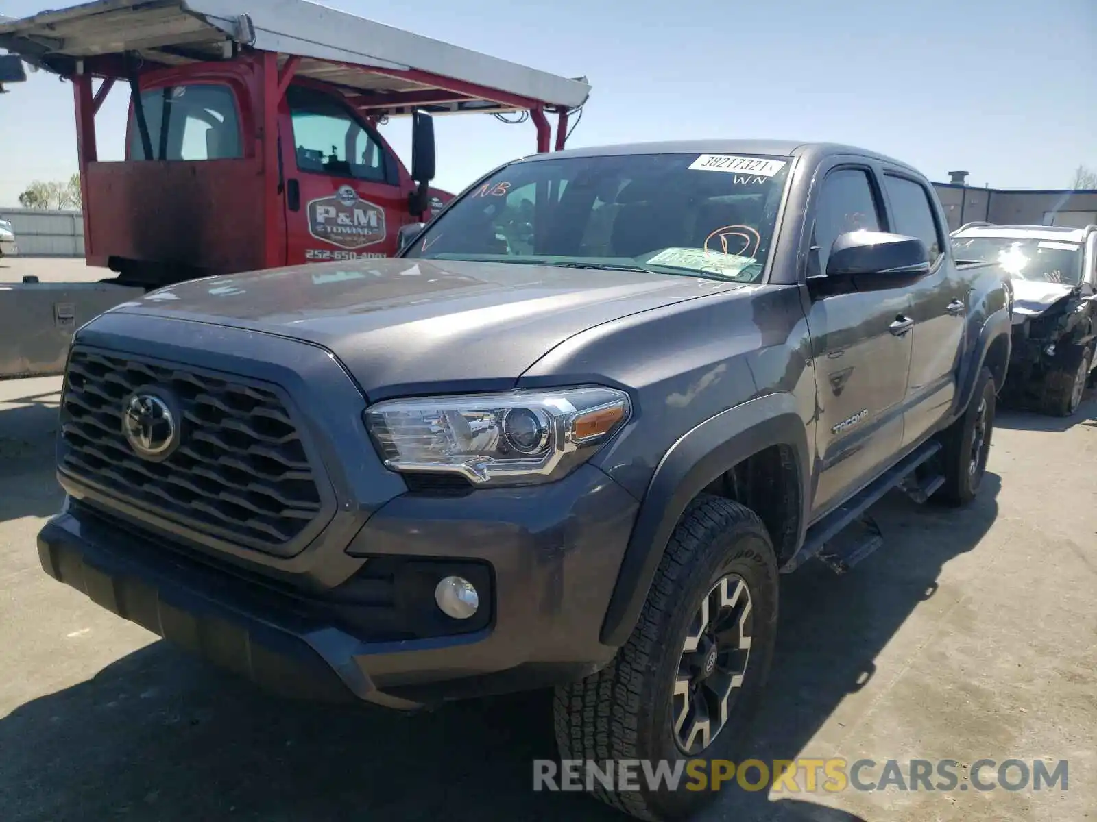 2 Photograph of a damaged car 5TFCZ5AN0LX238551 TOYOTA TACOMA 2020