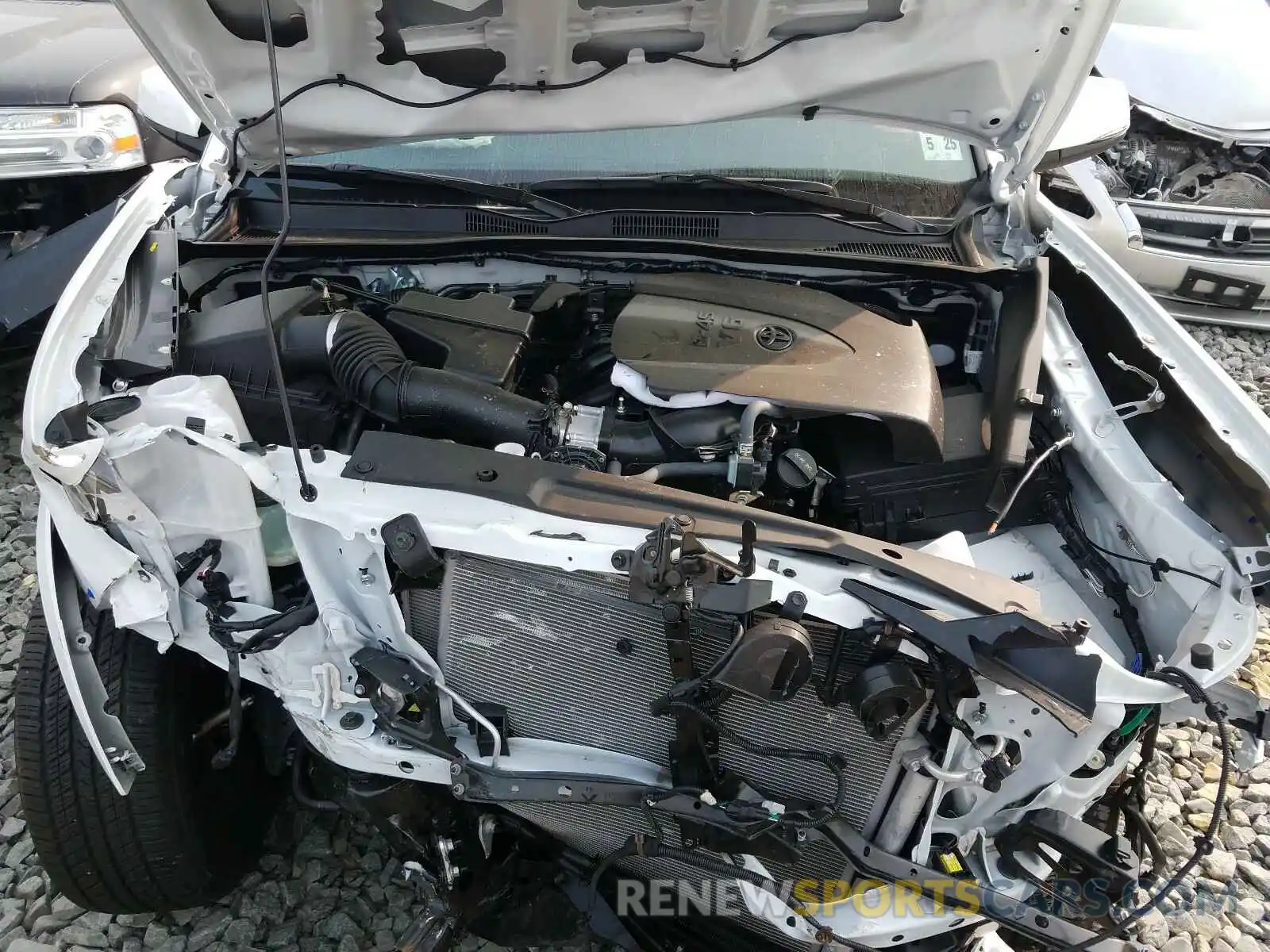 7 Photograph of a damaged car 5TFCZ5AN1LX233102 TOYOTA TACOMA 2020