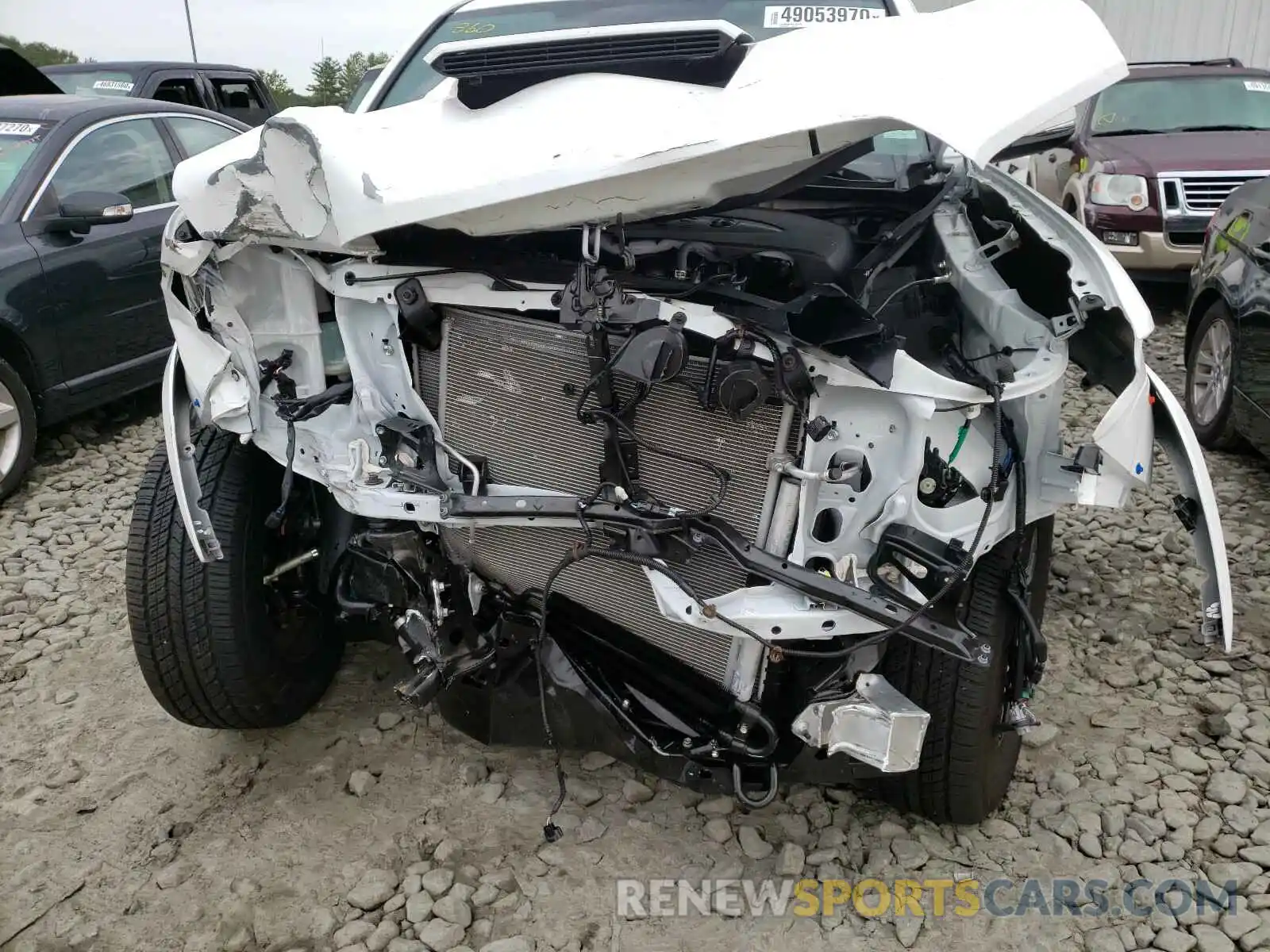 9 Photograph of a damaged car 5TFCZ5AN1LX233102 TOYOTA TACOMA 2020