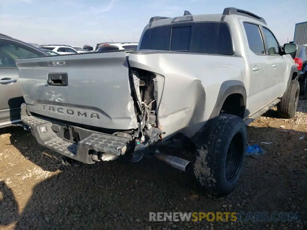 4 Photograph of a damaged car 5TFCZ5AN1LX233715 TOYOTA TACOMA 2020