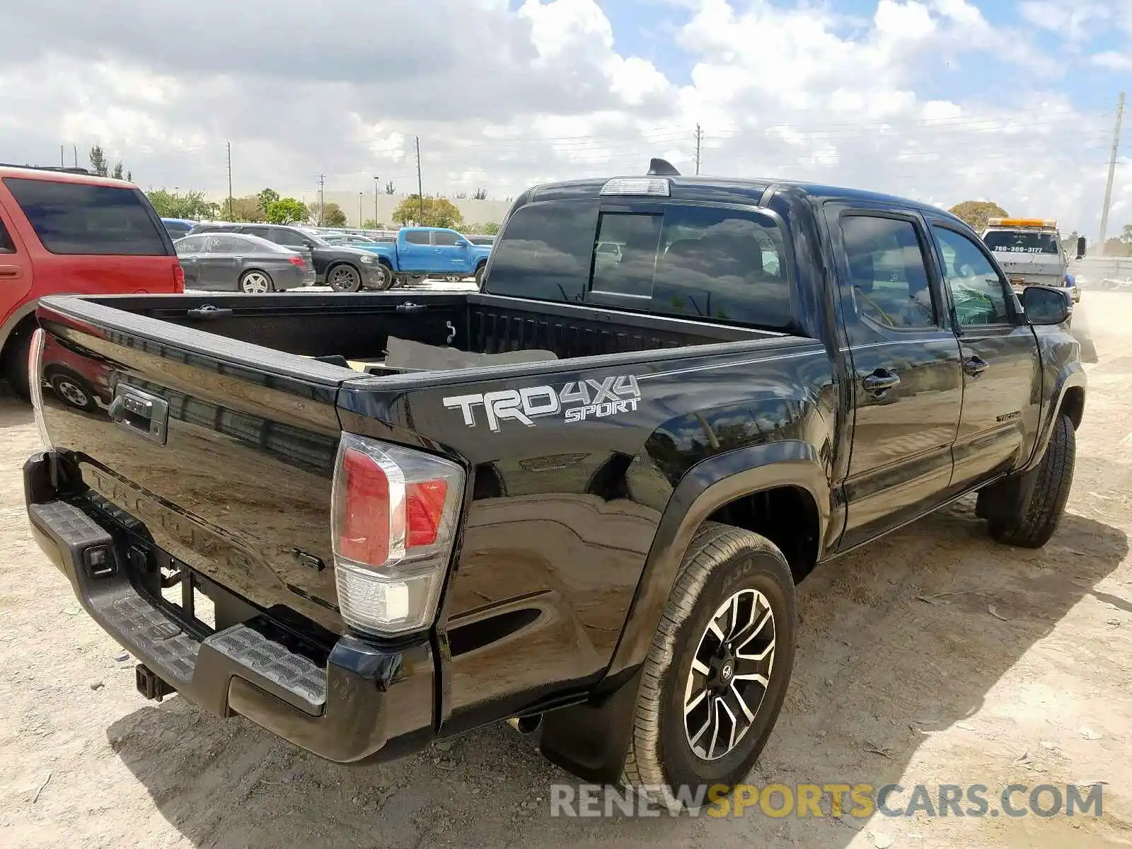 4 Photograph of a damaged car 5TFCZ5AN2LX214333 TOYOTA TACOMA 2020