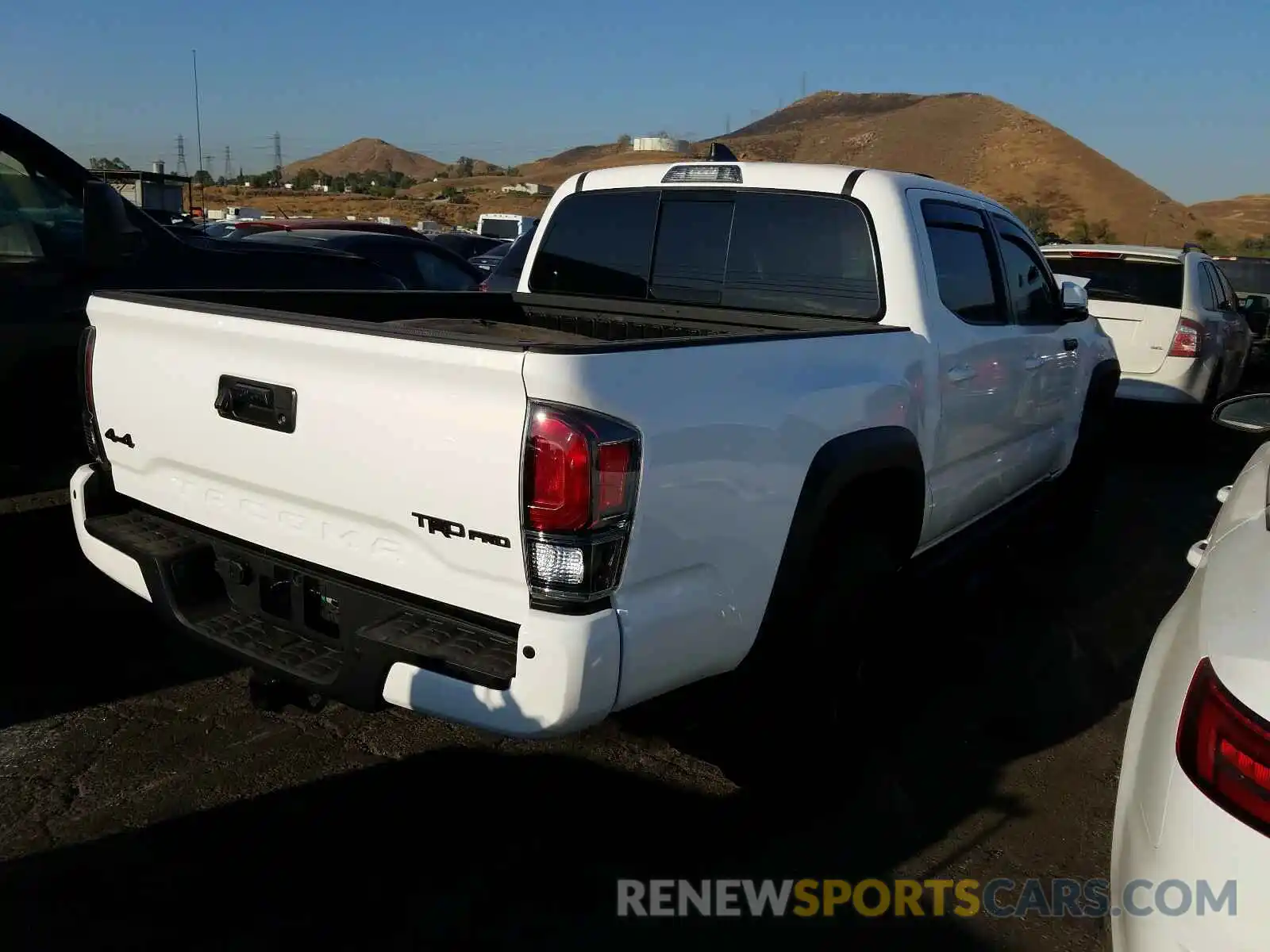 4 Photograph of a damaged car 5TFCZ5AN2LX237210 TOYOTA TACOMA 2020