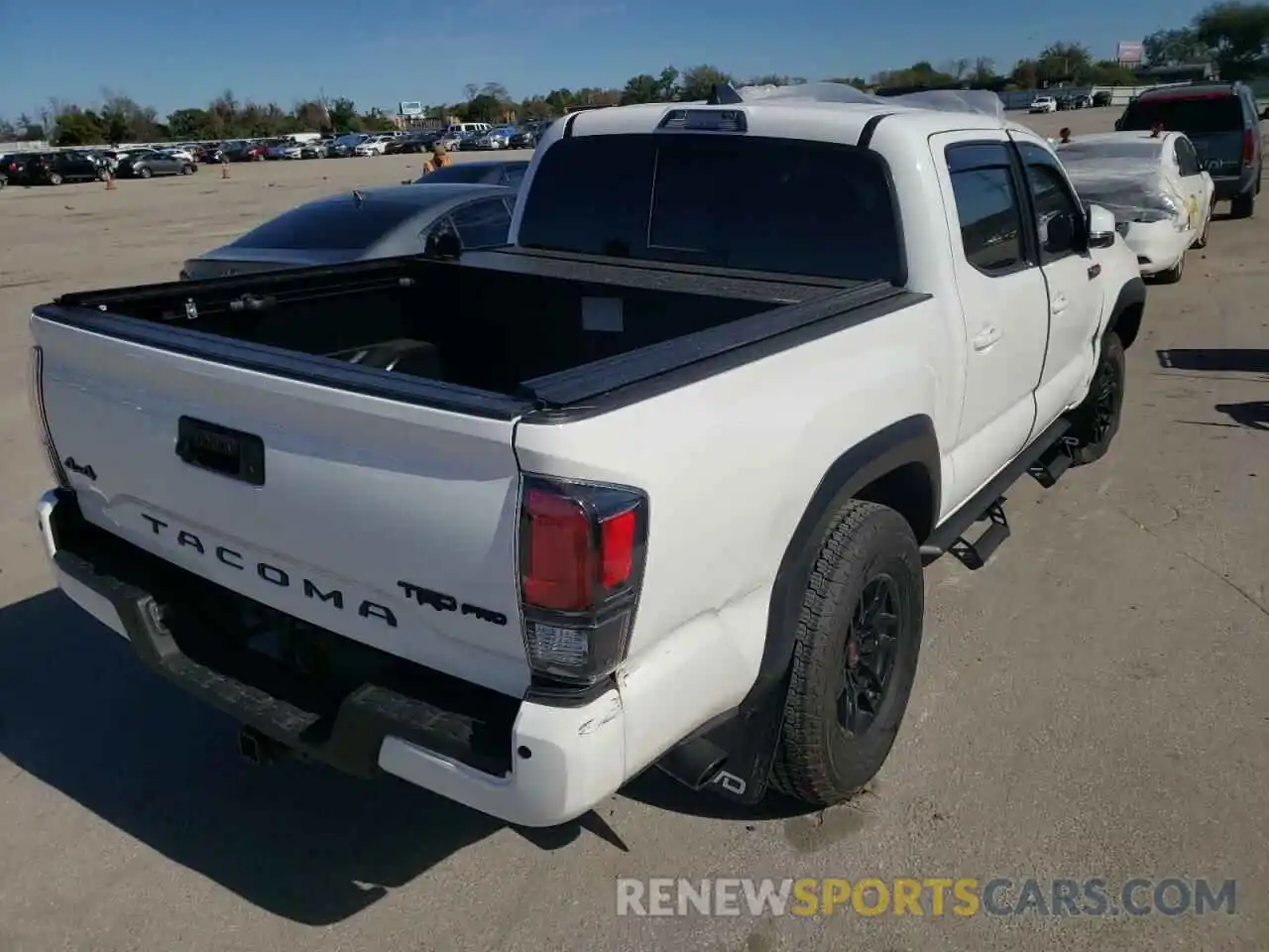 4 Photograph of a damaged car 5TFCZ5AN2LX237806 TOYOTA TACOMA 2020