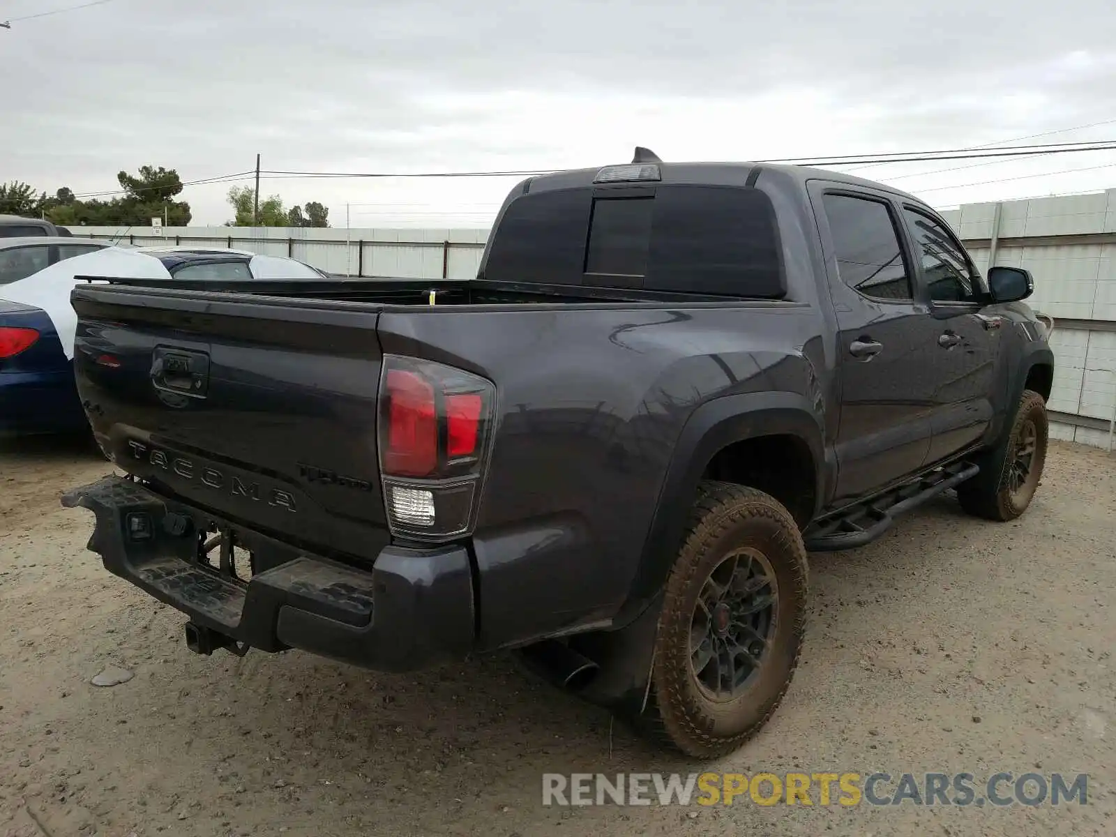 4 Photograph of a damaged car 5TFCZ5AN2LX239331 TOYOTA TACOMA 2020