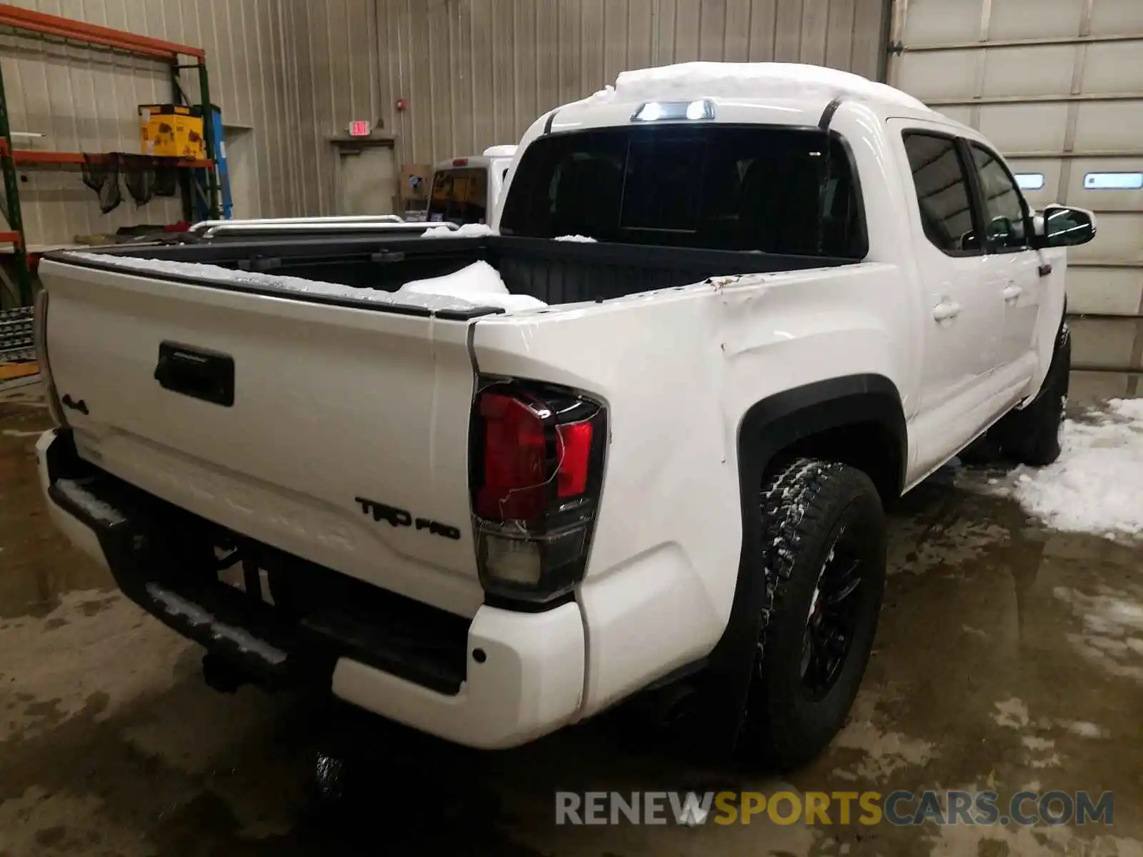 4 Photograph of a damaged car 5TFCZ5AN3LX214406 TOYOTA TACOMA 2020