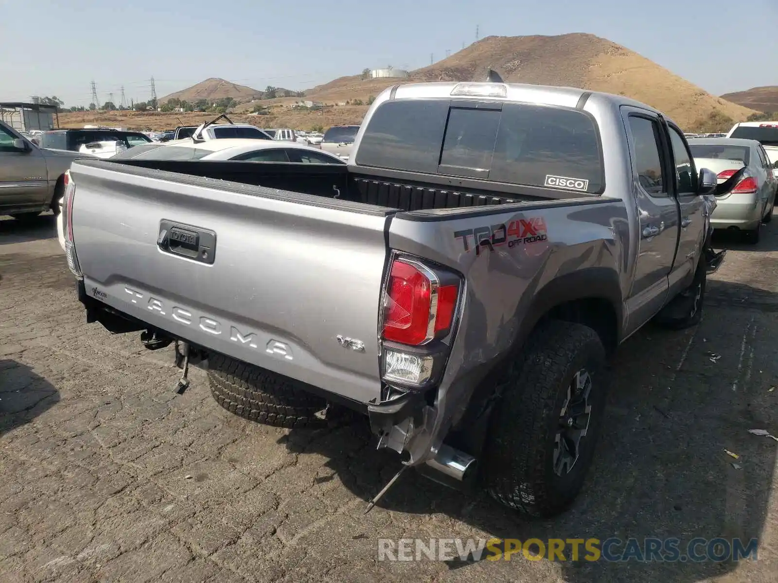 4 Photograph of a damaged car 5TFCZ5AN3LX225745 TOYOTA TACOMA 2020