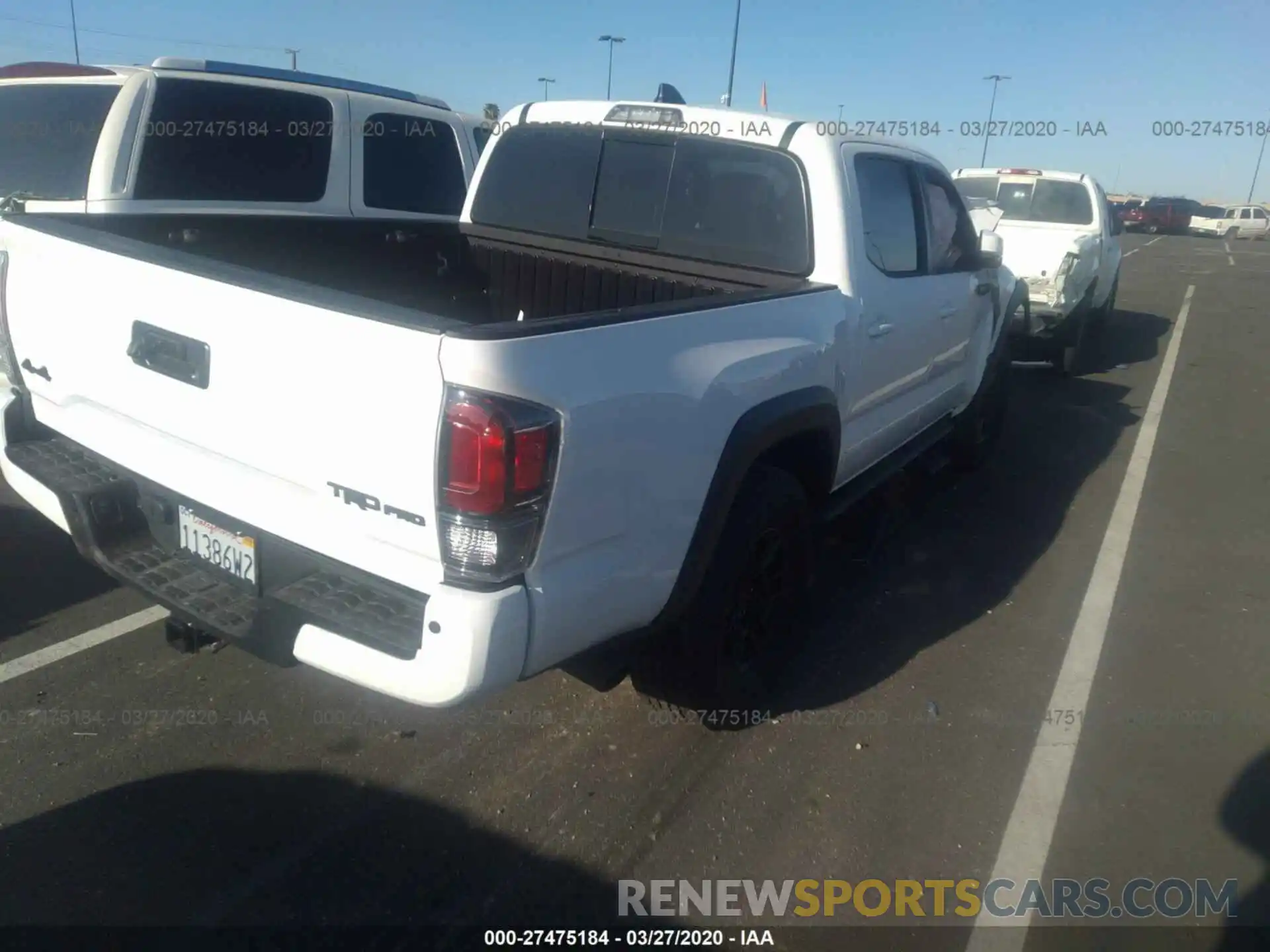 4 Photograph of a damaged car 5TFCZ5AN4LX216259 TOYOTA TACOMA 2020