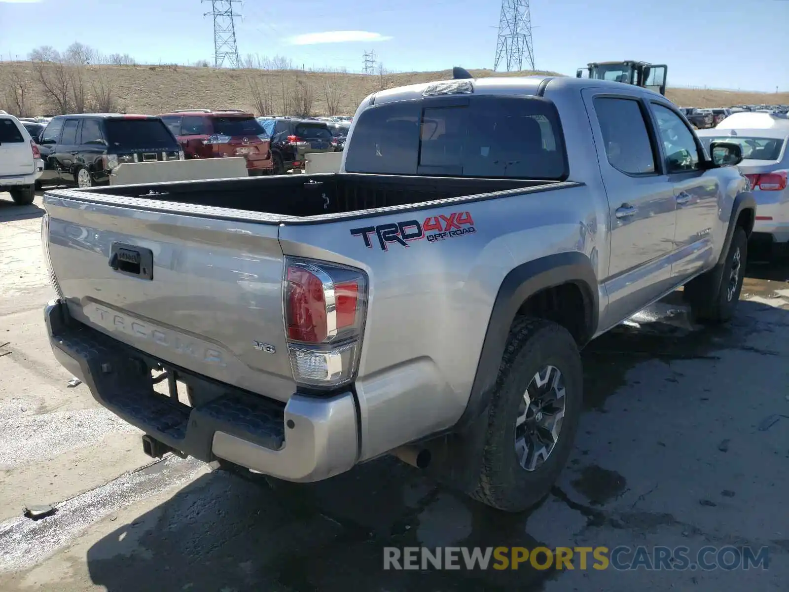 4 Photograph of a damaged car 5TFCZ5AN4LX228590 TOYOTA TACOMA 2020