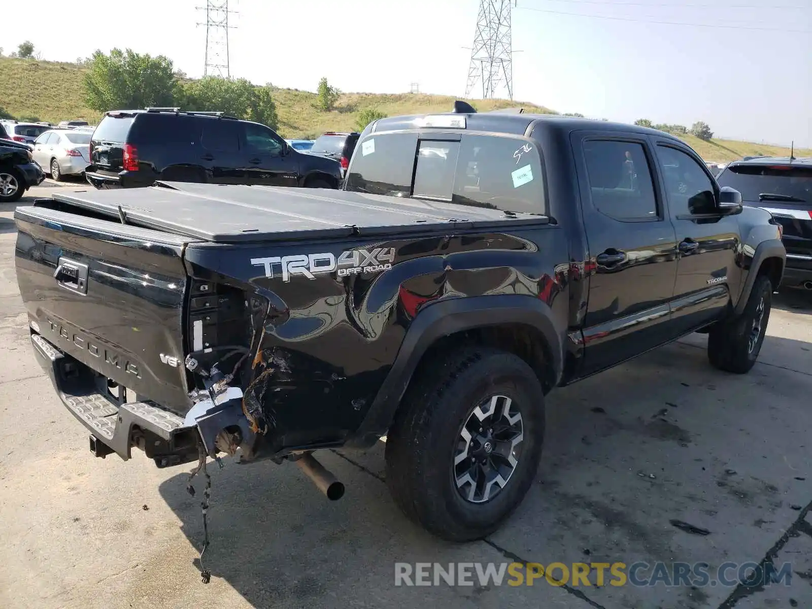 4 Photograph of a damaged car 5TFCZ5AN5LX221857 TOYOTA TACOMA 2020