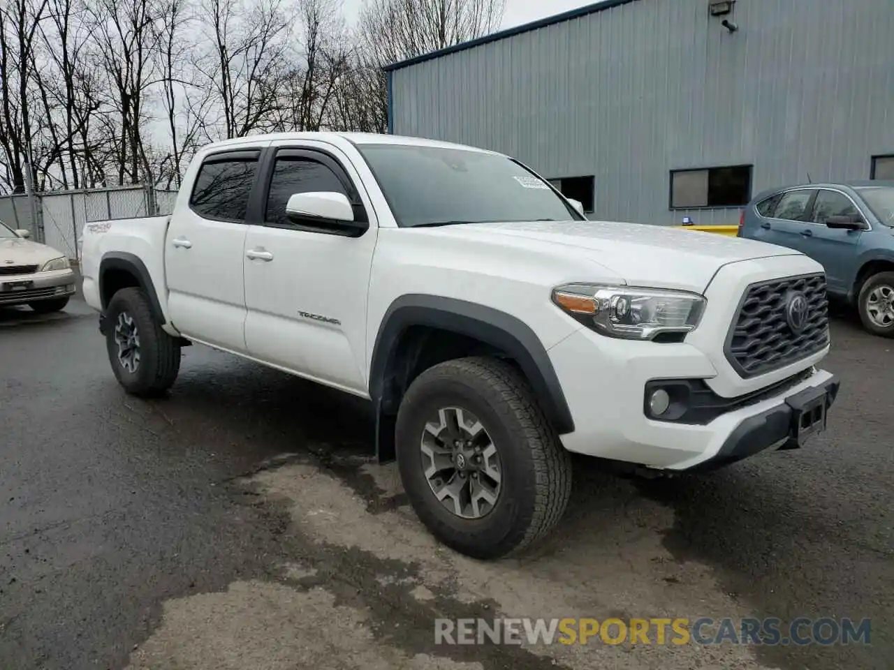 4 Photograph of a damaged car 5TFCZ5AN5LX242899 TOYOTA TACOMA 2020