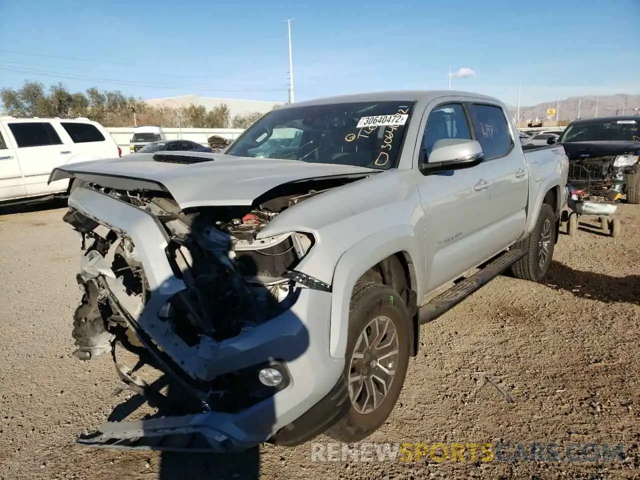 2 Photograph of a damaged car 5TFCZ5AN6LX213881 TOYOTA TACOMA 2020