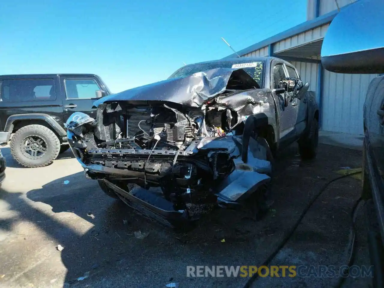 2 Photograph of a damaged car 5TFCZ5AN6LX227702 TOYOTA TACOMA 2020