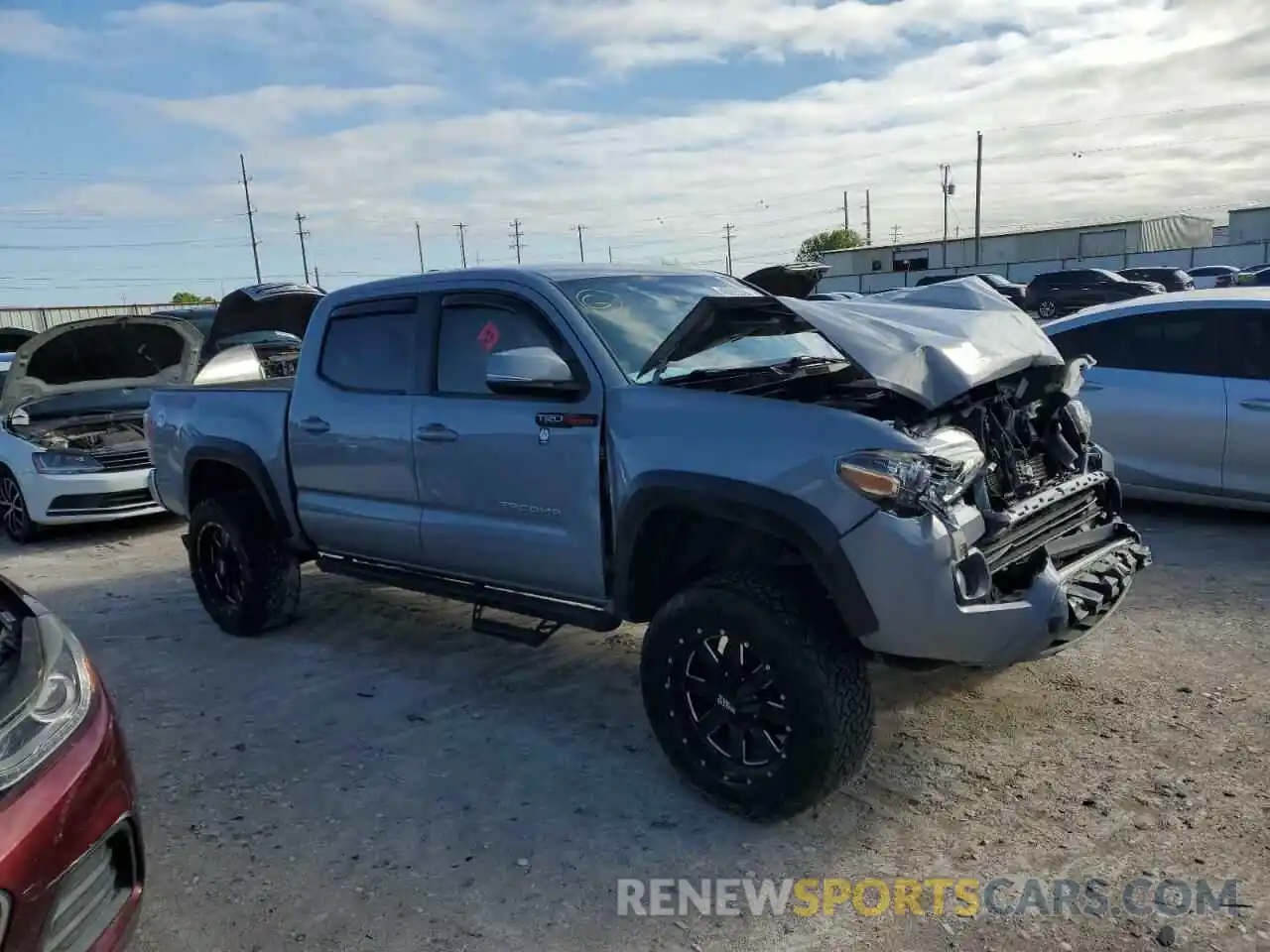 4 Photograph of a damaged car 5TFCZ5AN6LX231913 TOYOTA TACOMA 2020