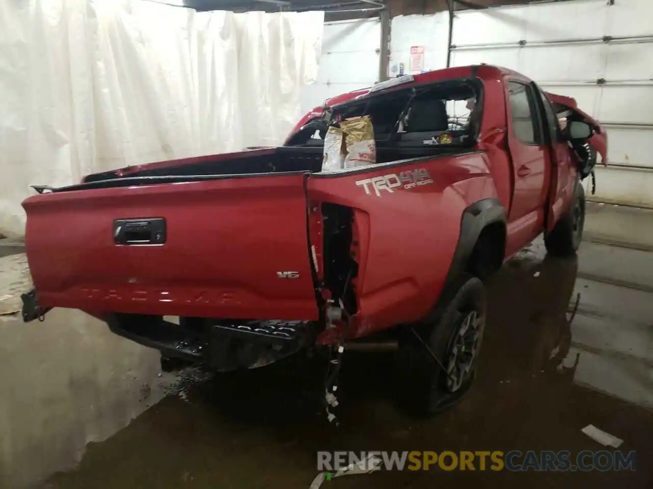 4 Photograph of a damaged car 5TFCZ5AN7LX217762 TOYOTA TACOMA 2020