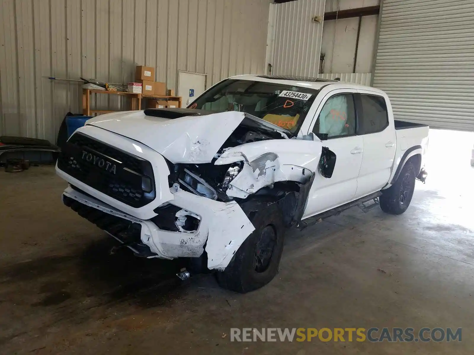 2 Photograph of a damaged car 5TFCZ5AN7LX218099 TOYOTA TACOMA 2020