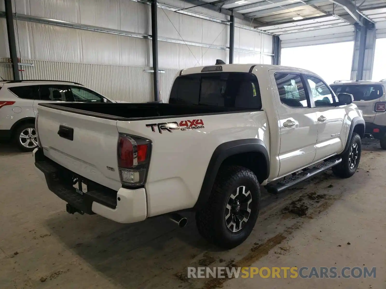 4 Photograph of a damaged car 5TFCZ5AN7LX220127 TOYOTA TACOMA 2020