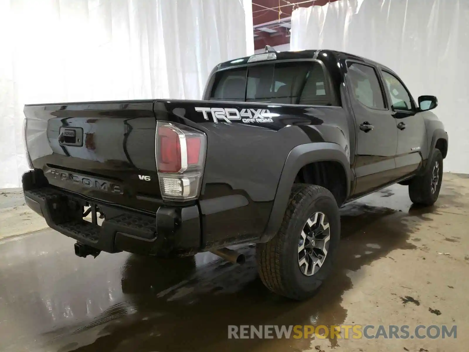 4 Photograph of a damaged car 5TFCZ5AN7LX230706 TOYOTA TACOMA 2020