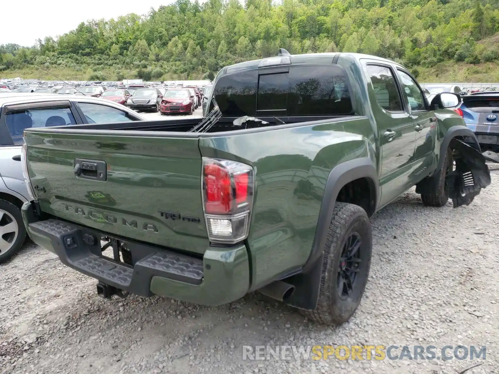 4 Photograph of a damaged car 5TFCZ5AN8LX214918 TOYOTA TACOMA 2020