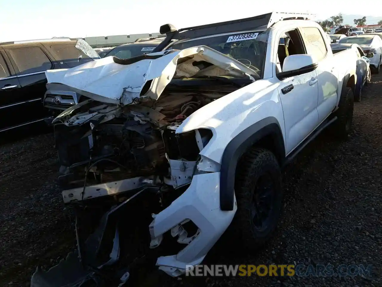 2 Photograph of a damaged car 5TFCZ5AN8LX217415 TOYOTA TACOMA 2020