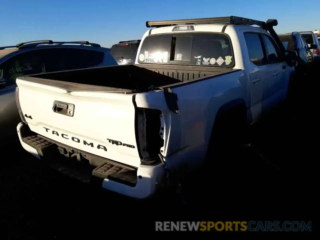 4 Photograph of a damaged car 5TFCZ5AN8LX217415 TOYOTA TACOMA 2020