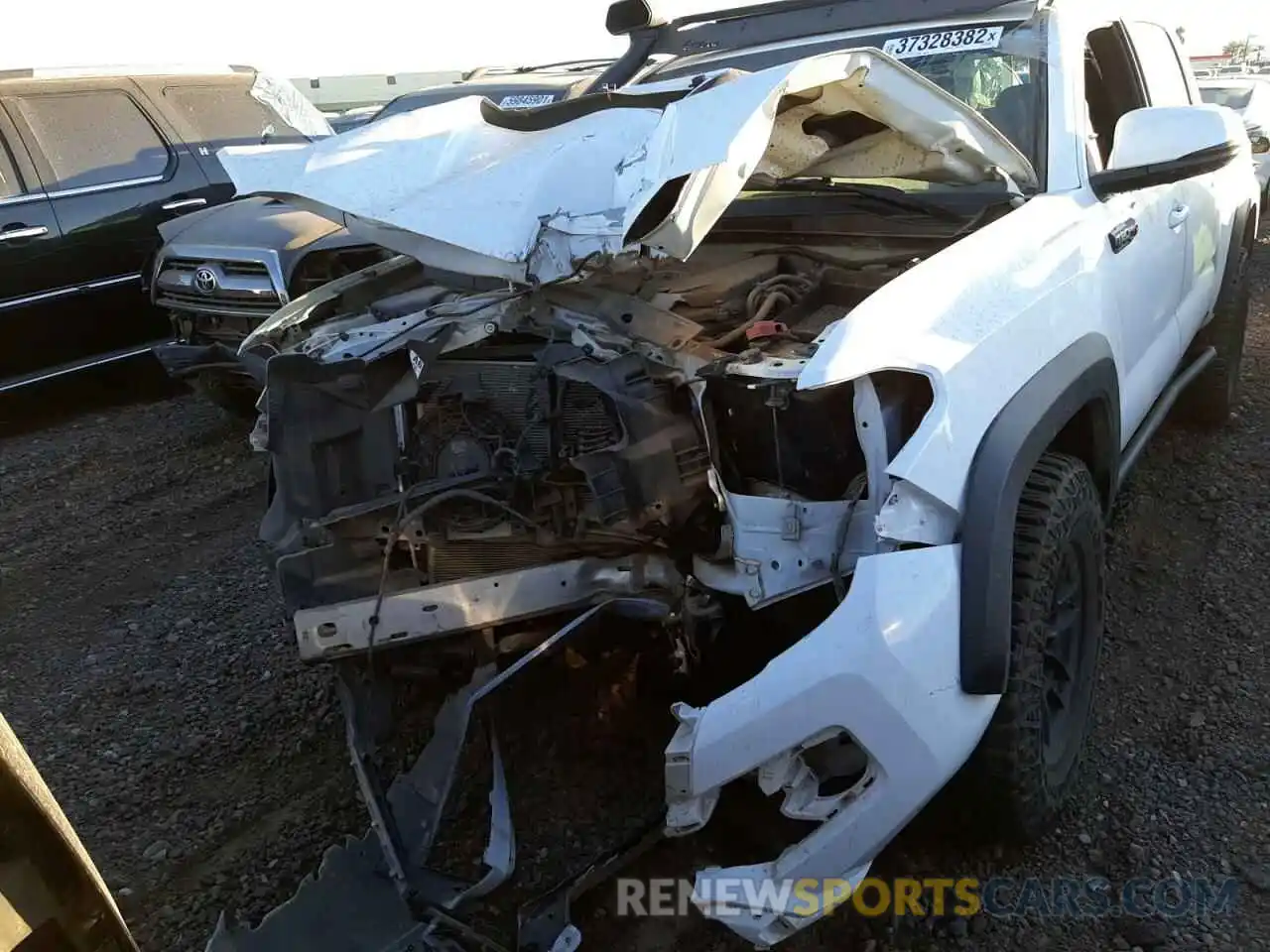 9 Photograph of a damaged car 5TFCZ5AN8LX217415 TOYOTA TACOMA 2020