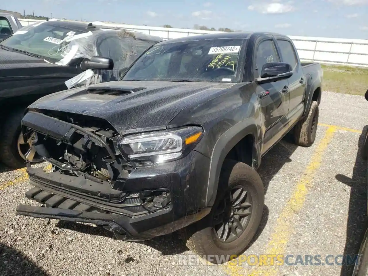 2 Photograph of a damaged car 5TFCZ5AN8LX233887 TOYOTA TACOMA 2020