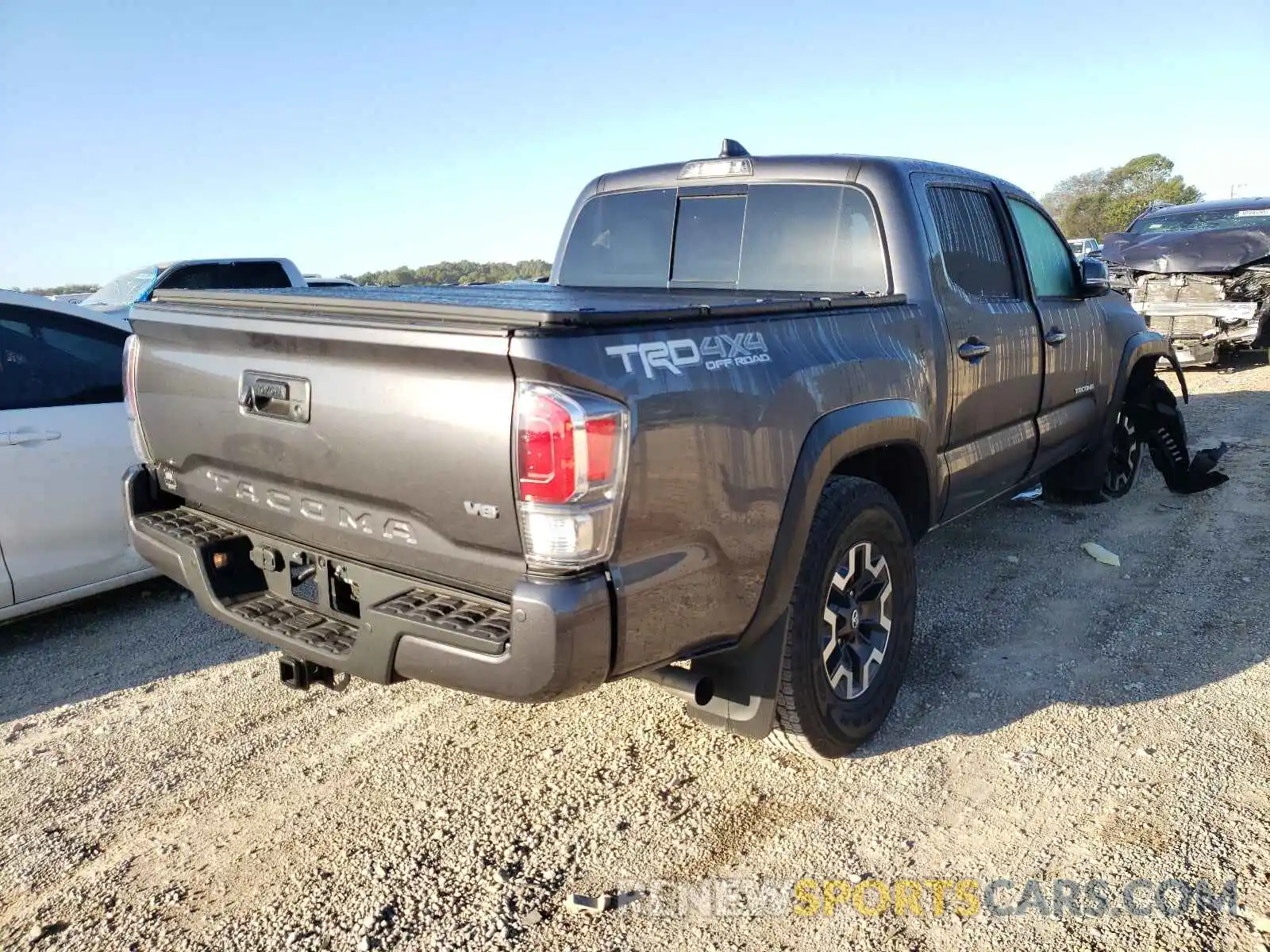 4 Photograph of a damaged car 5TFCZ5AN8LX235039 TOYOTA TACOMA 2020