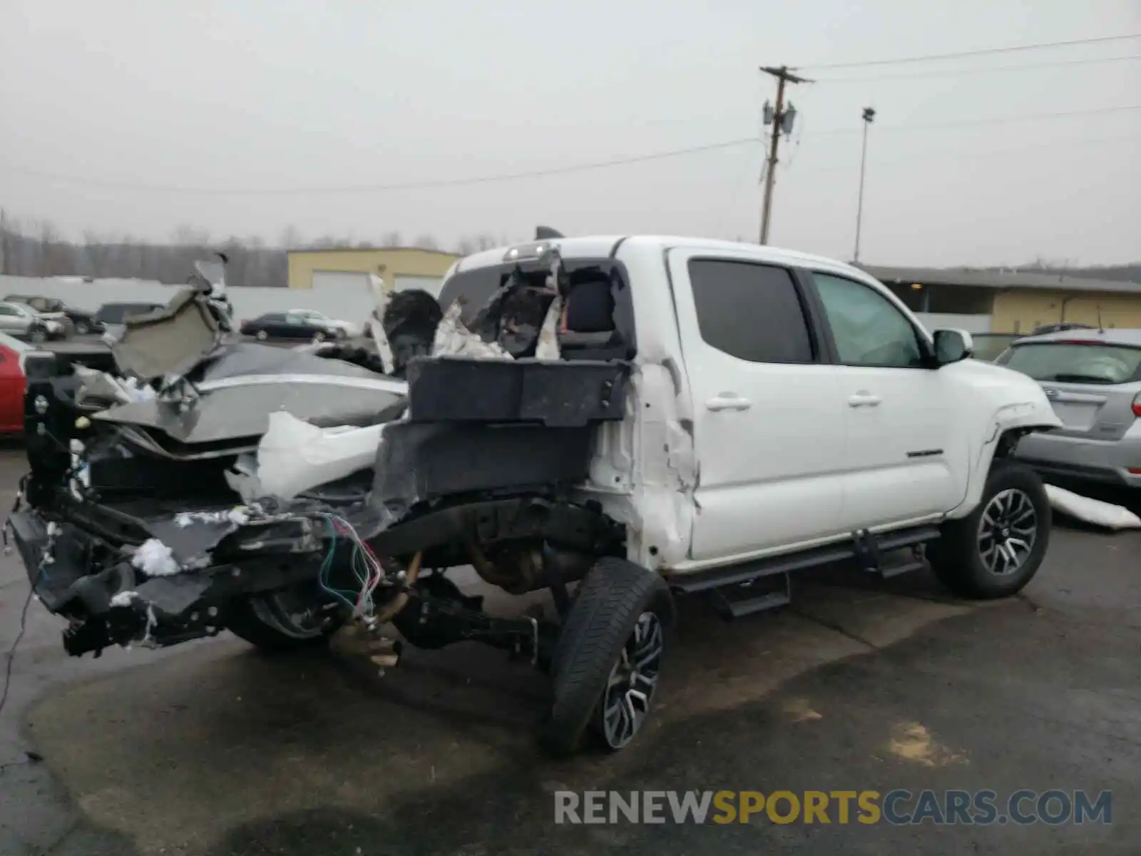 4 Photograph of a damaged car 5TFCZ5AN8LX241441 TOYOTA TACOMA 2020