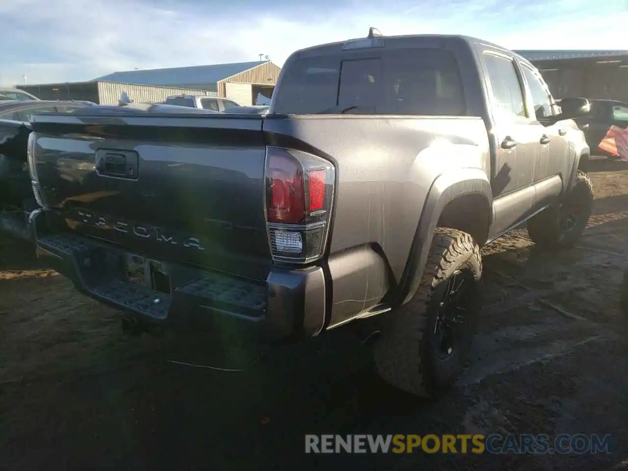 4 Photograph of a damaged car 5TFCZ5AN9LX215463 TOYOTA TACOMA 2020