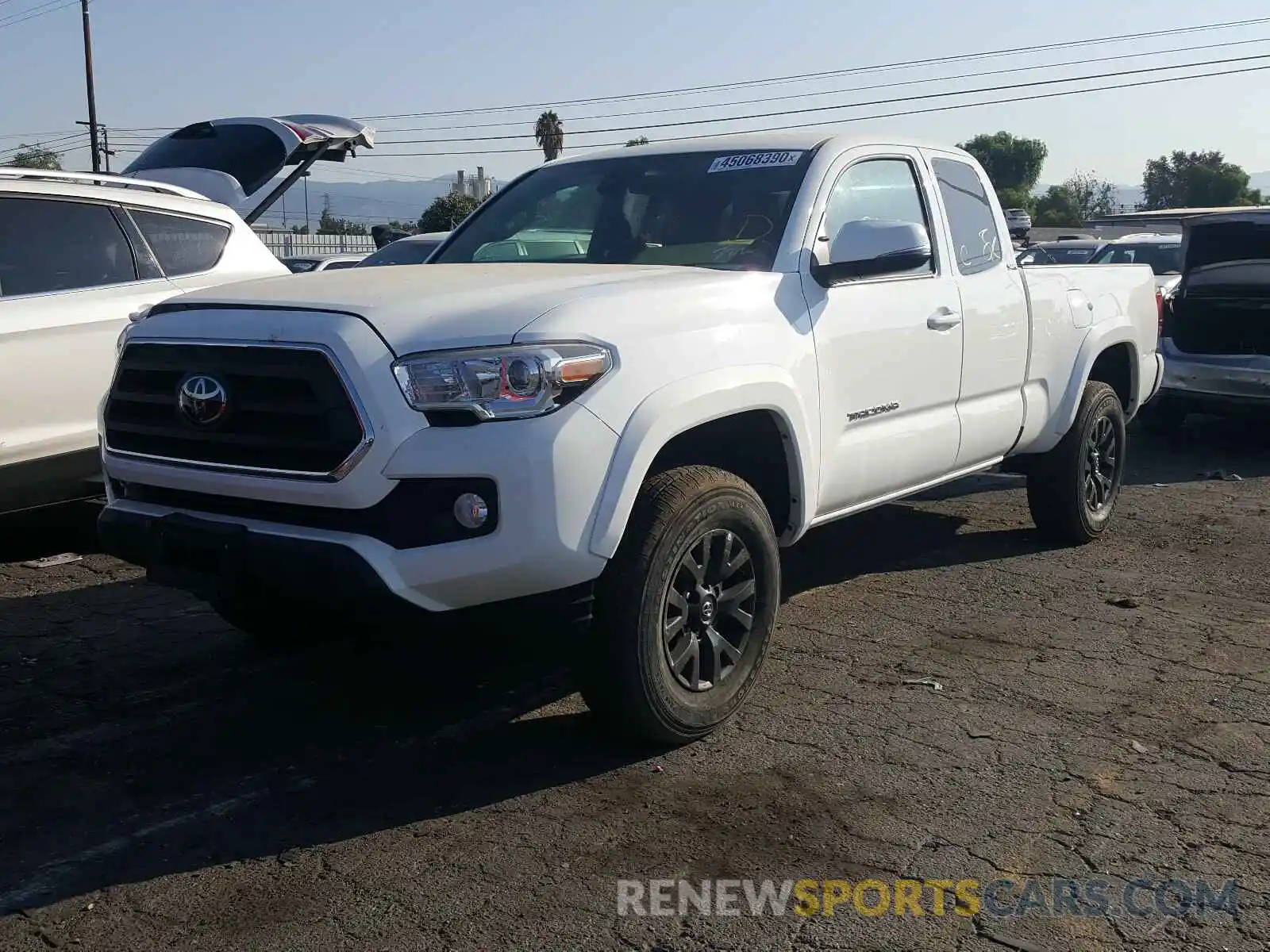 2 Photograph of a damaged car 5TFRZ5CNXLX089833 TOYOTA TACOMA 2020