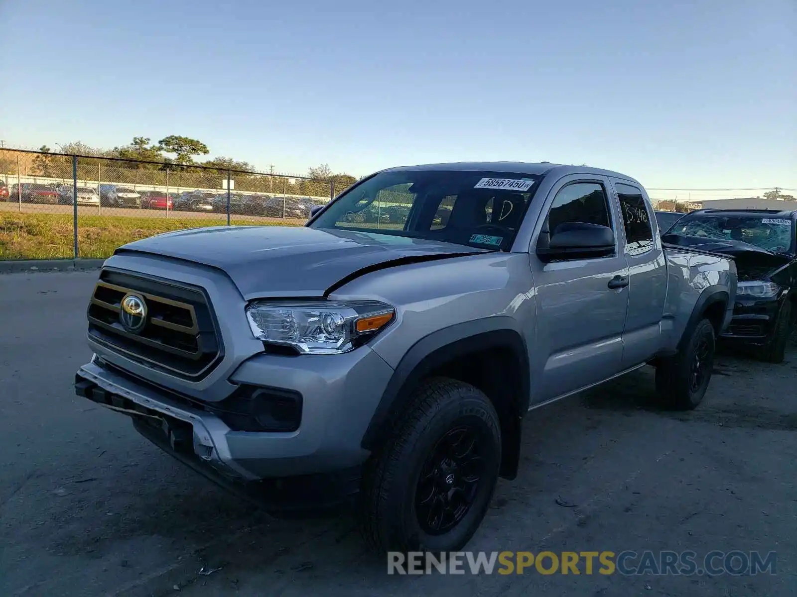 2 Photograph of a damaged car 5TFSZ5AN0LX215962 TOYOTA TACOMA 2020