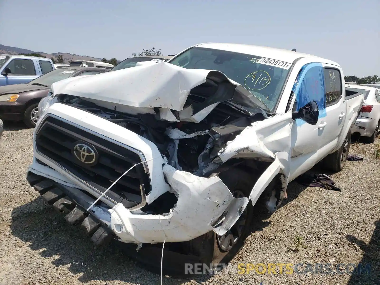 2 Photograph of a damaged car 3TMAZ5CN0MM144455 TOYOTA TACOMA 2021