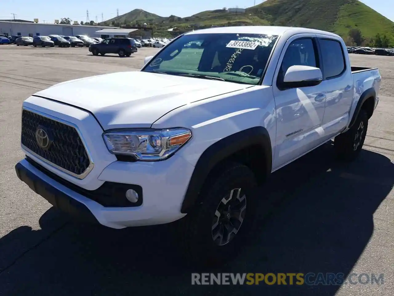 2 Photograph of a damaged car 3TMAZ5CN0NM167316 TOYOTA TACOMA 2021