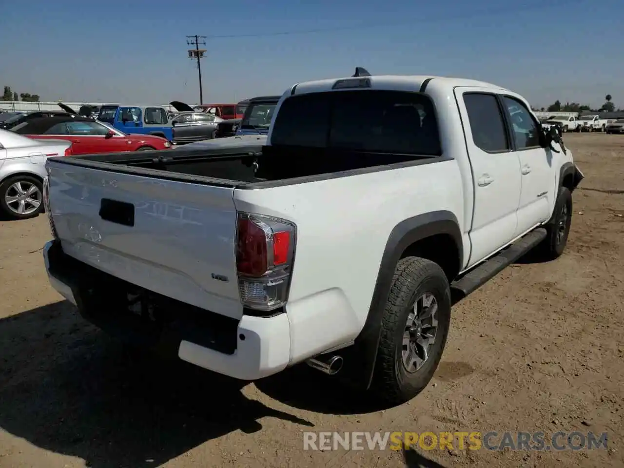 4 Photograph of a damaged car 3TMAZ5CN2MM145686 TOYOTA TACOMA 2021