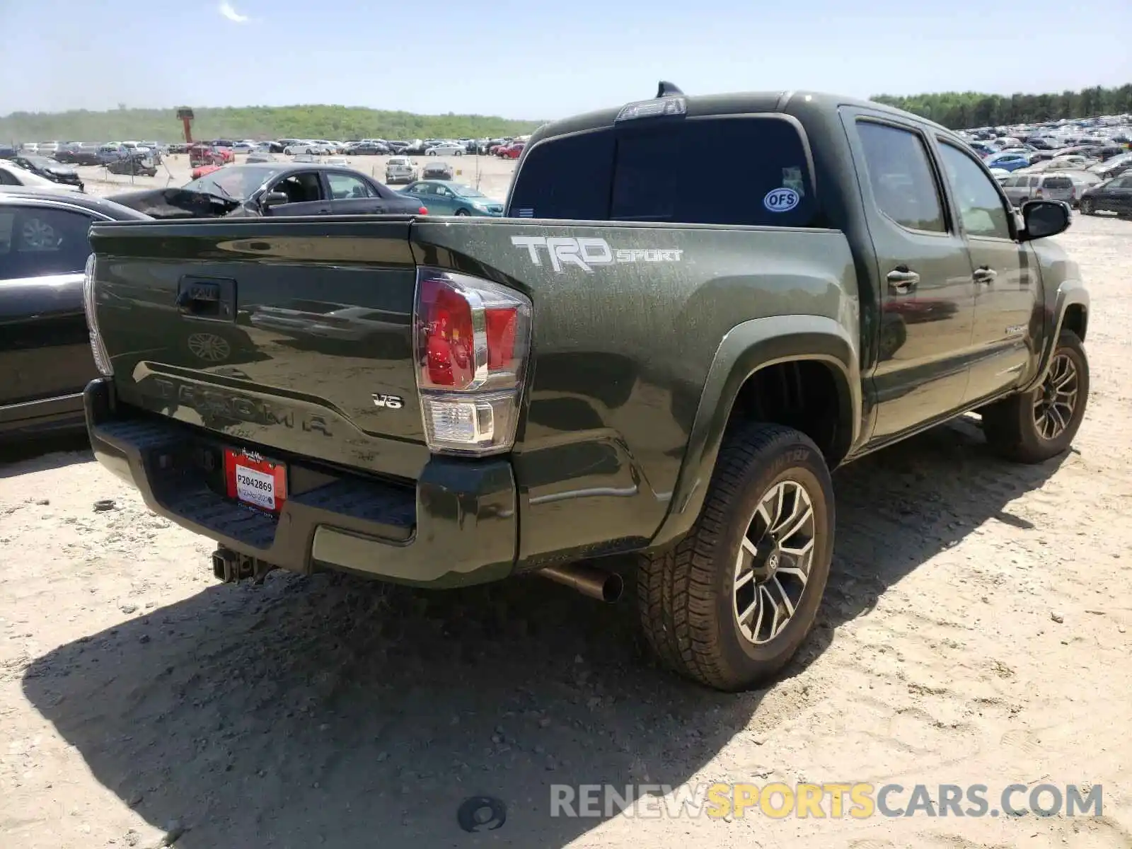 4 Photograph of a damaged car 3TMAZ5CN2MM147311 TOYOTA TACOMA 2021