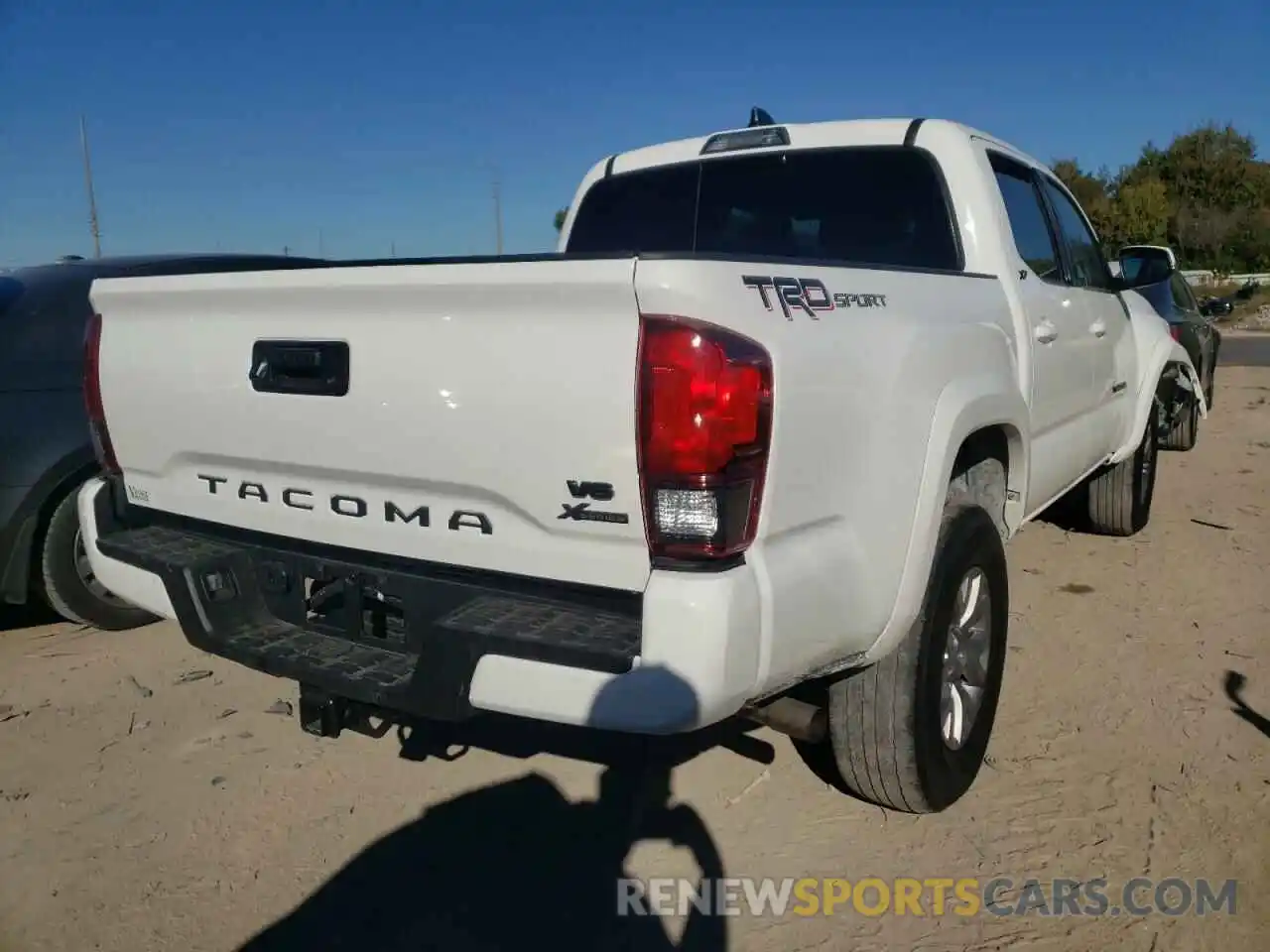 4 Photograph of a damaged car 3TMAZ5CN2MM152671 TOYOTA TACOMA 2021