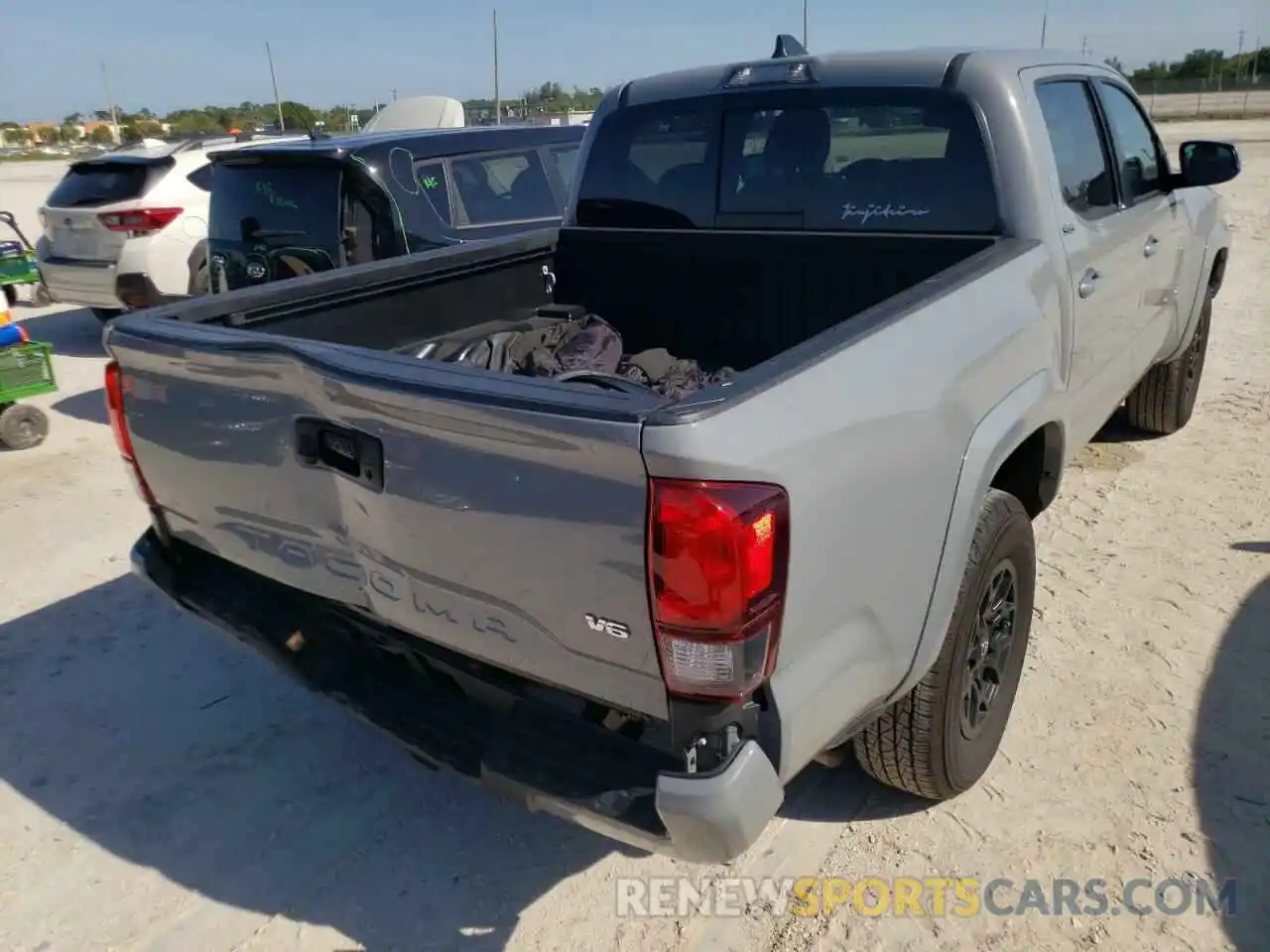 4 Photograph of a damaged car 3TMAZ5CN4MM147424 TOYOTA TACOMA 2021