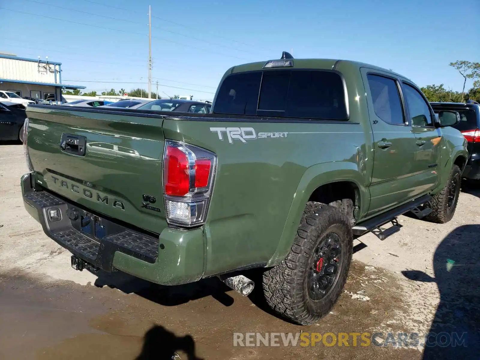 4 Photograph of a damaged car 3TMAZ5CN5MM142958 TOYOTA TACOMA 2021