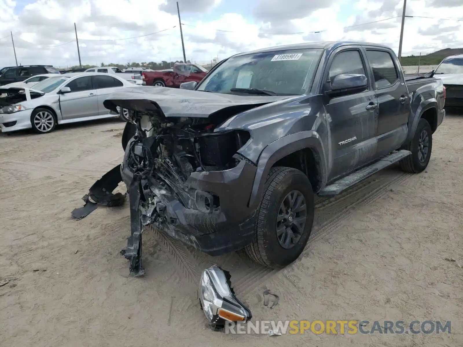 2 Photograph of a damaged car 3TMAZ5CN7MM141262 TOYOTA TACOMA 2021