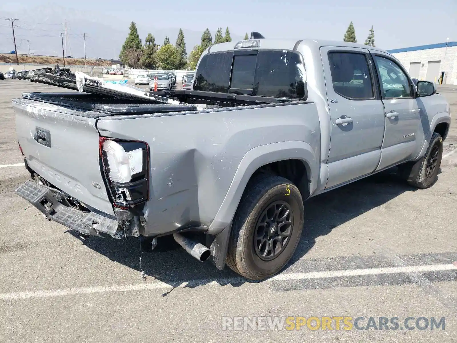 4 Photograph of a damaged car 3TMAZ5CN7MM141410 TOYOTA TACOMA 2021