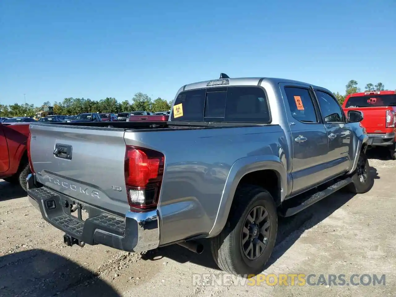 4 Photograph of a damaged car 3TMAZ5CN7MM149619 TOYOTA TACOMA 2021