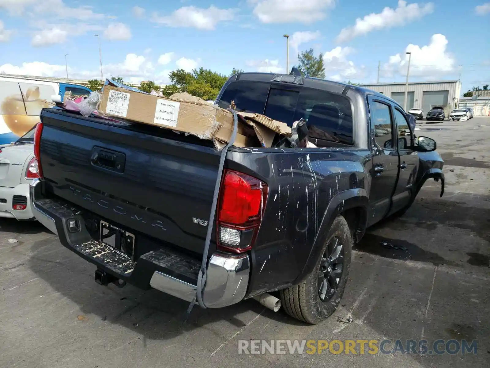 4 Photograph of a damaged car 3TMAZ5CN8MM142744 TOYOTA TACOMA 2021