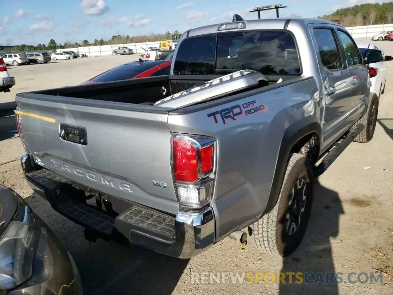 4 Photograph of a damaged car 3TMAZ5CN9MM153963 TOYOTA TACOMA 2021