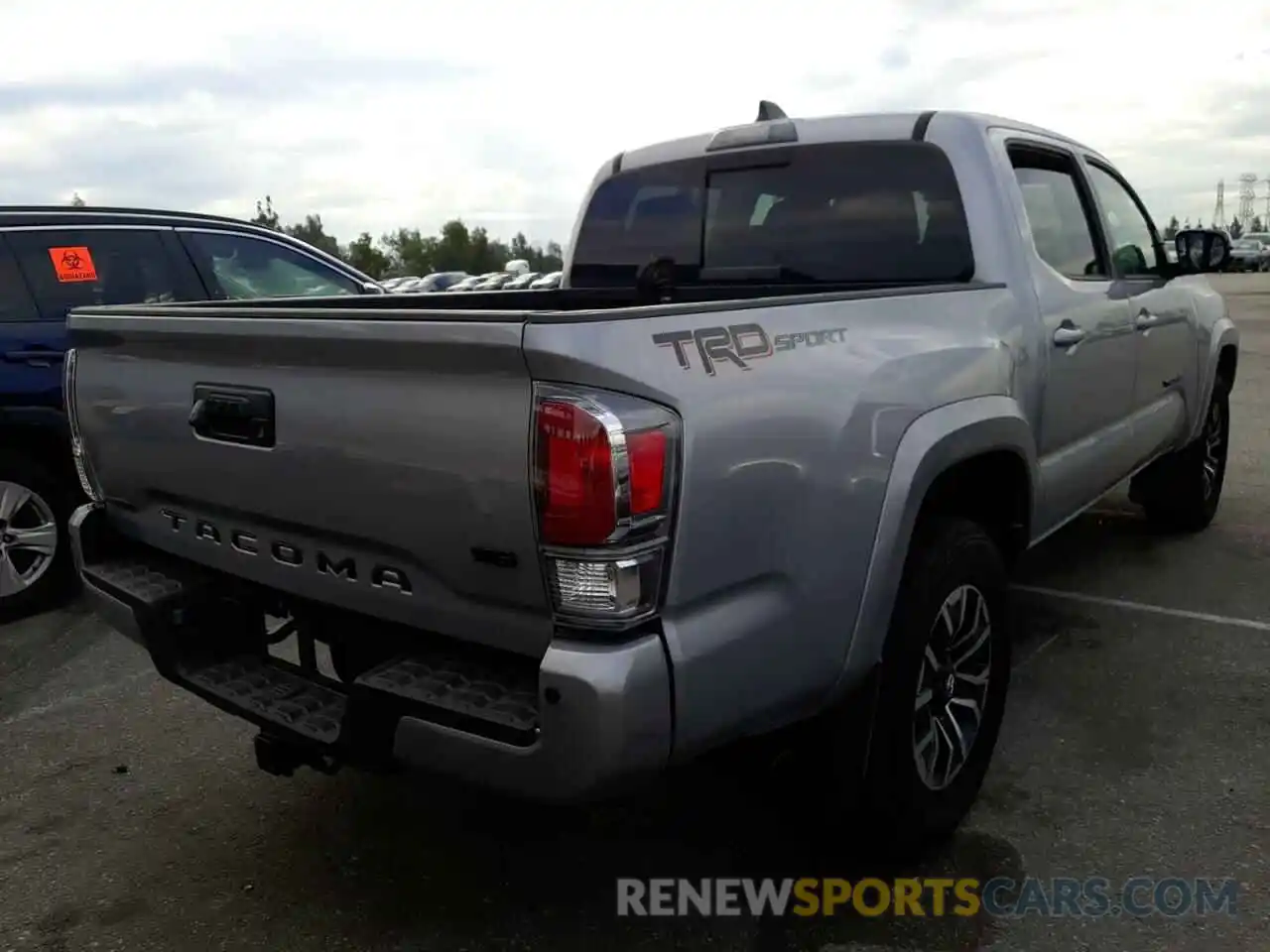 4 Photograph of a damaged car 3TMAZ5CNXMM156838 TOYOTA TACOMA 2021